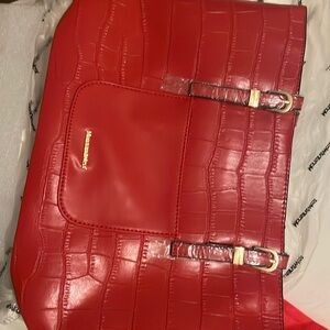 Snake skin like purse many compartments. New with dust bag